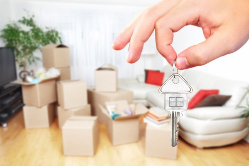 Staff checking a property access route before moving items