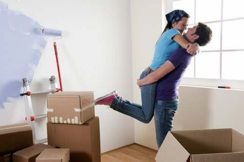 Customer preparing belongings for removal truck hire