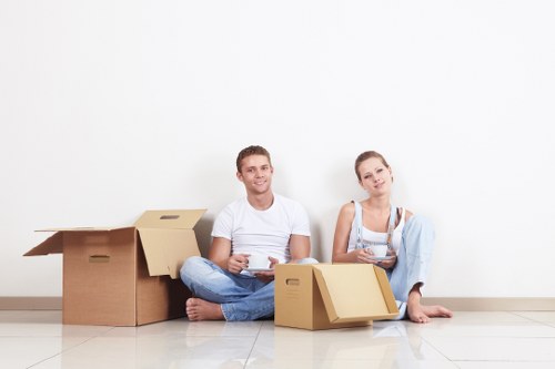 Packed office boxes and furniture ready for relocation